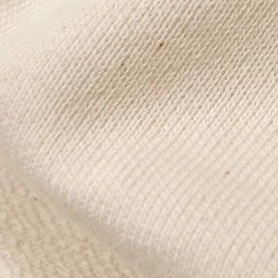 薄手裏毛ニット穴開きダメージ加工（アイボリー）表面感><br clear=